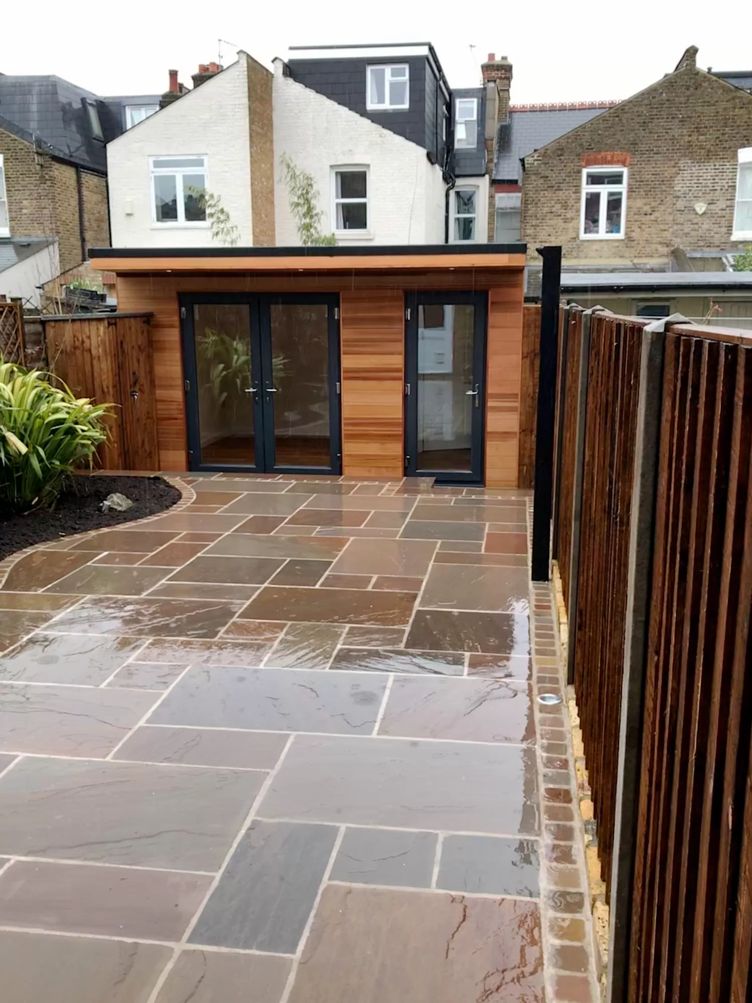 long patio with garden house