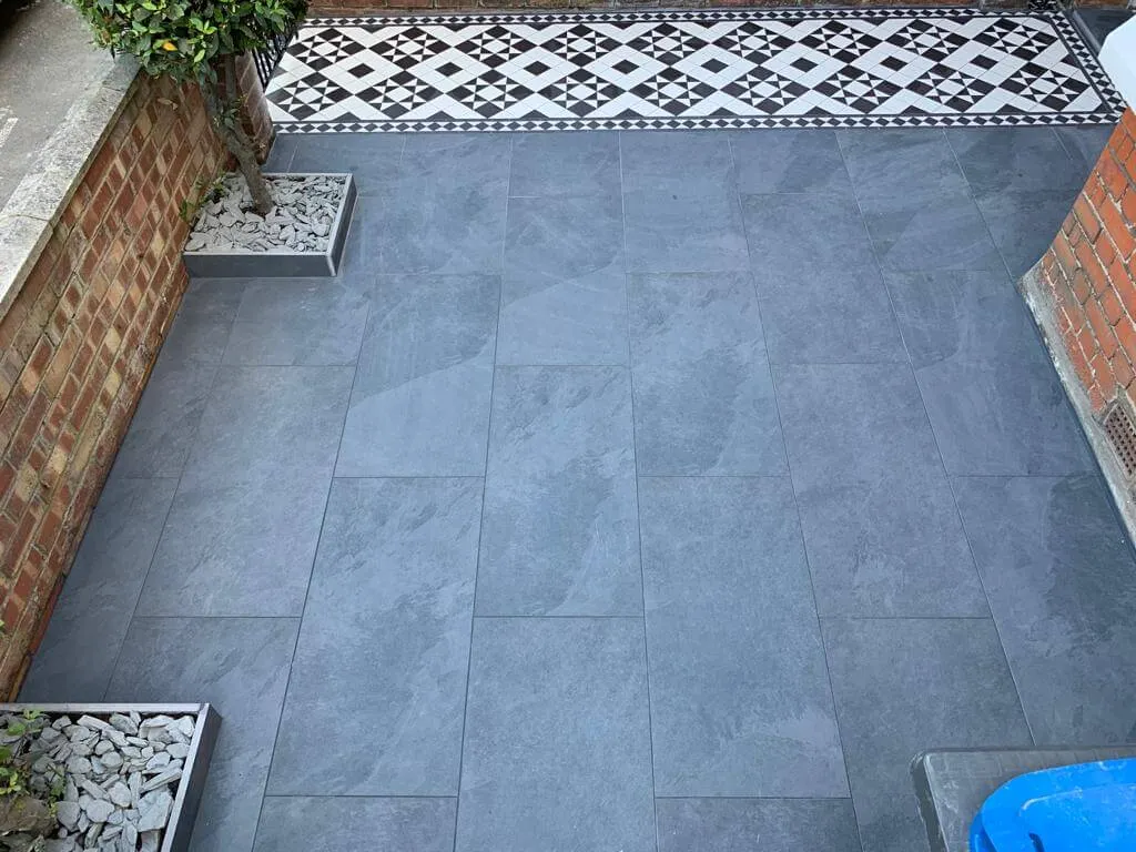 front patio with dark grey tiles