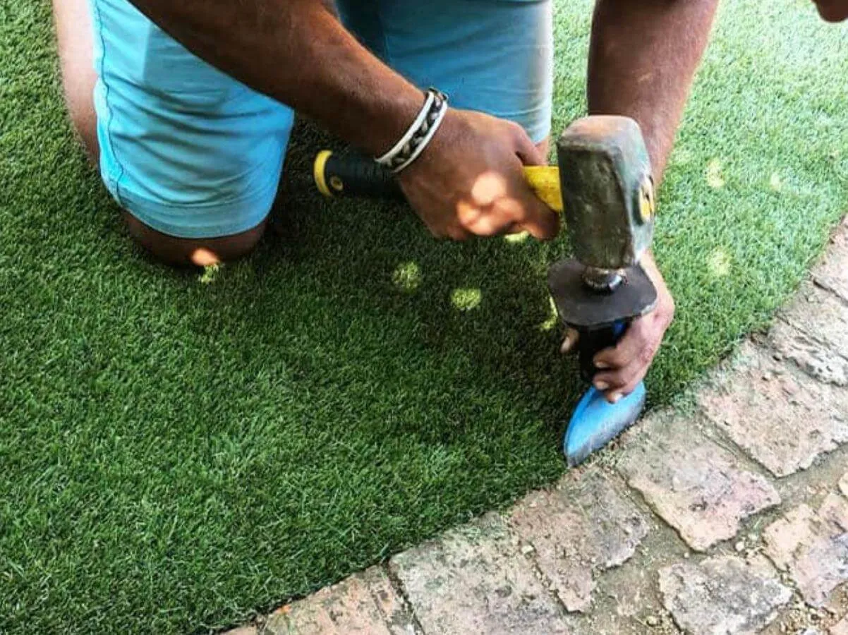 cutting down artificial grass