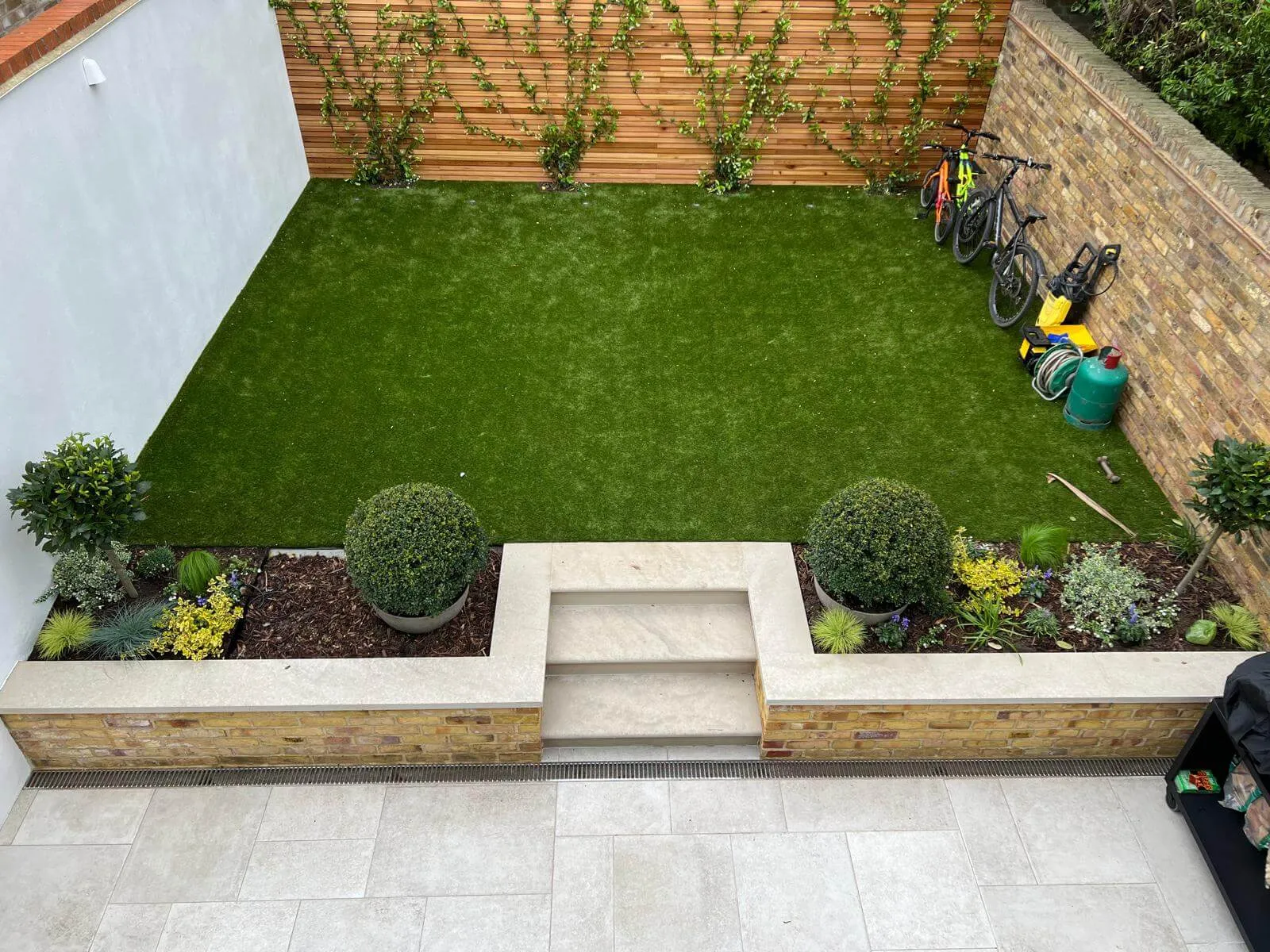 small artificial grass with white steps
