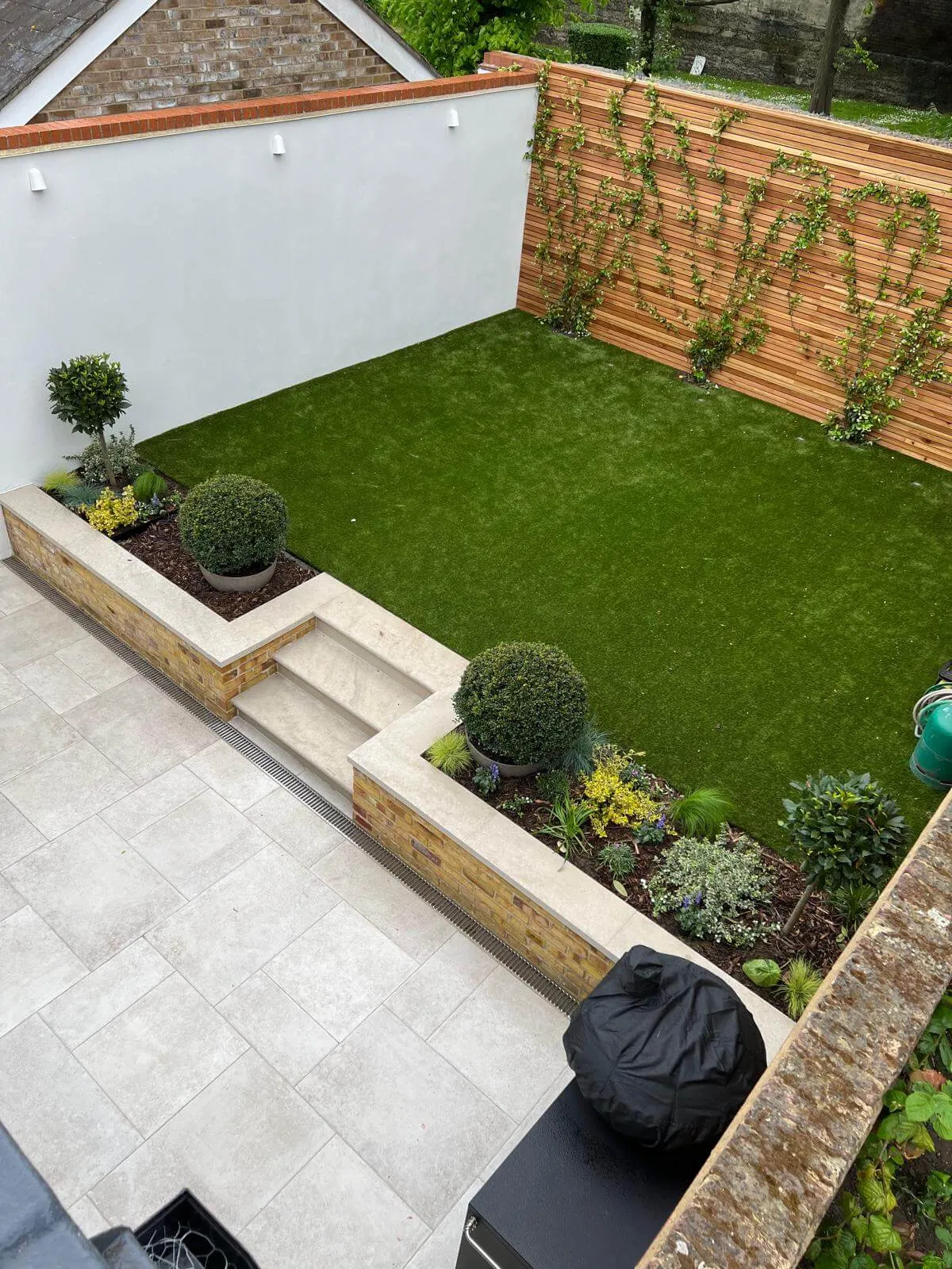 different view of artificial grass with steps