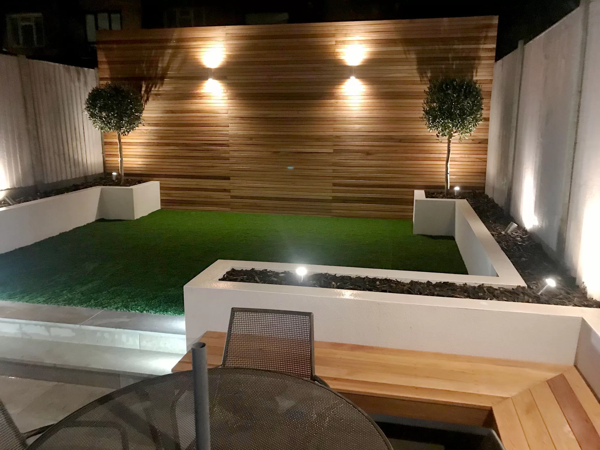 lights on garden wall with lights around floor